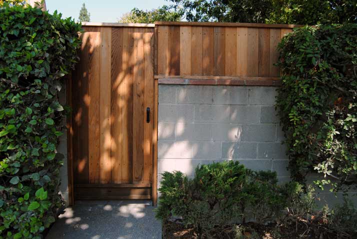 Raise the Height of Your Backyard Wall by Adding a Fence