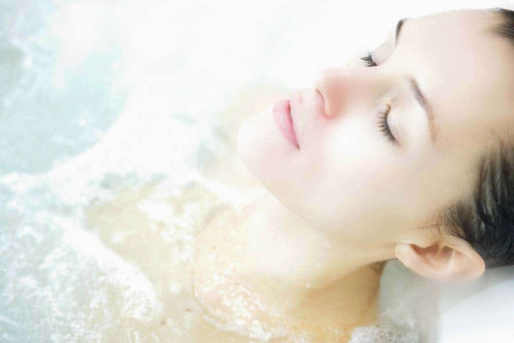 Beautiful woman dreaming in the spa.