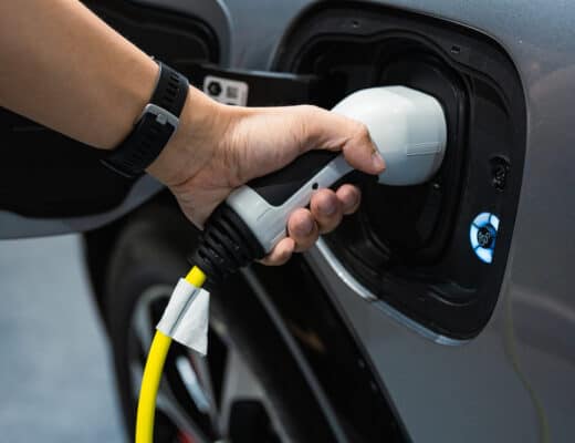 Hand charging modern electric car