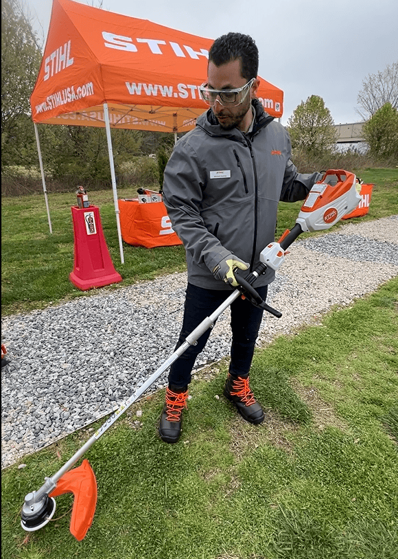 Product Segment Manager, Ahmed Hamdy, shows off Stihl Battery-Operated Outdoor Power Equipment - KMA 80 Multi Tool