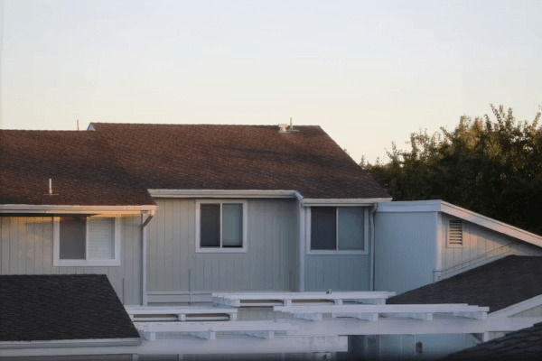 The Growing Focus on Exterior Simplicity in Modern Home Updates 2 a row of houses sitting next to each other