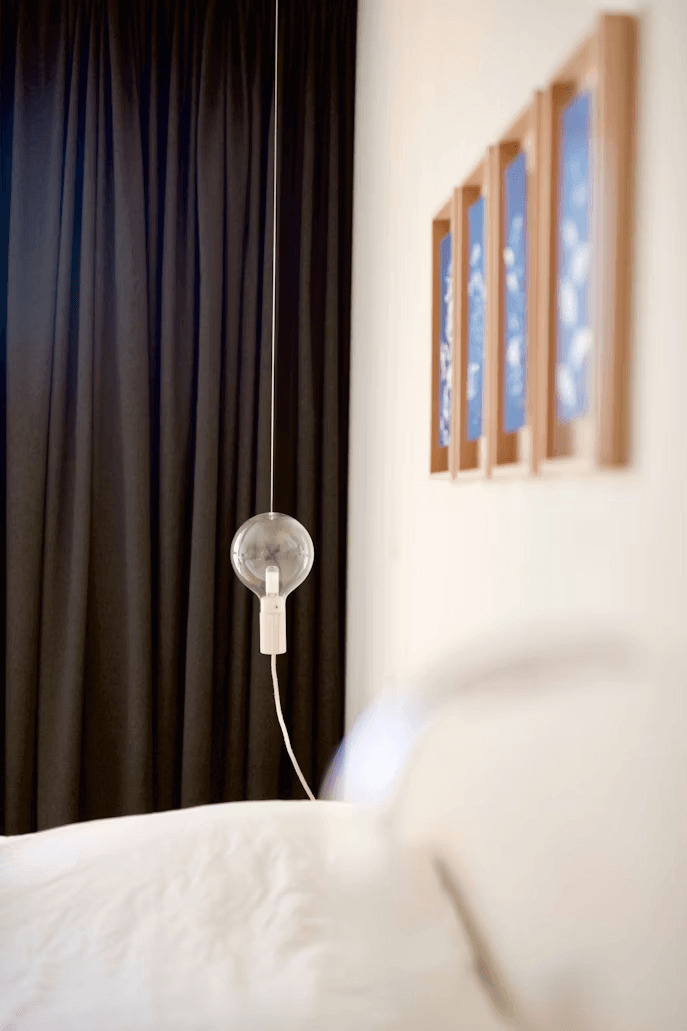 How Blackout Curtains Can Transform Your Home’s Comfort and Energy Efficiency 1 Bedroom with black blackout curtains for improved comfort