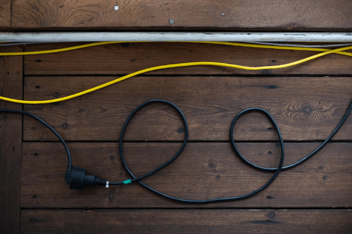 Ethernet wires on a wooden surface