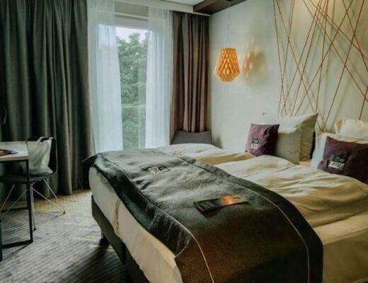 How Blackout Curtains Can Transform Your Home’s Comfort and Energy Efficiency 6 Hotel room with blackout curtains and two
