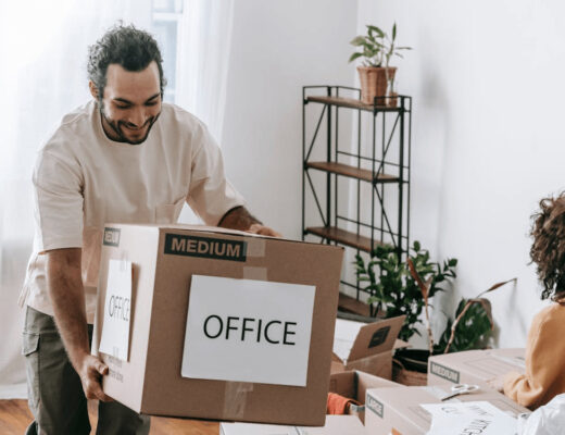 Office Relocation and Employee Adaptability - How to Make the Transition Work 7 Man unpacking an office box during relocation
