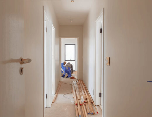 How to Secure Windows Against Break-Ins Without Major Renovation 5 Men securing windows on a house to prevent break