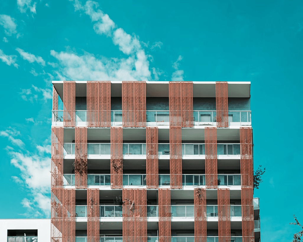 Tall building with many windows, possibly under renovation or