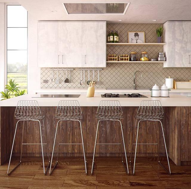Three Key Ways to Create a Functional and Fresh Kitchen 1 A modern kitchen featuring ample counter space and inviting bar