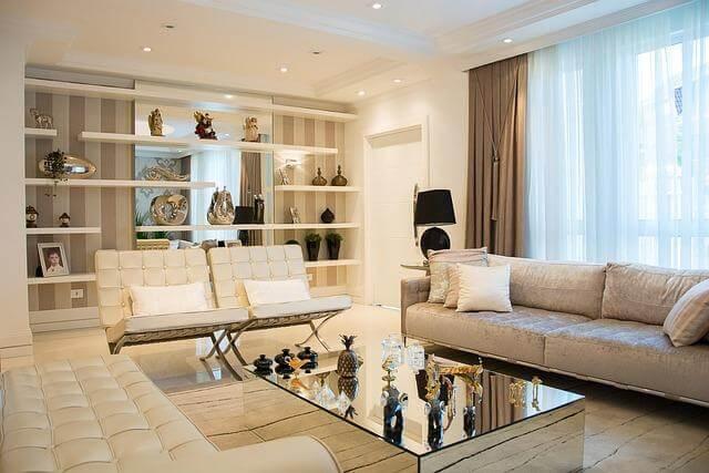 A spacious living room with elegant furniture and a