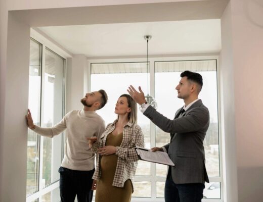 Group of people discussing home purchase in an office