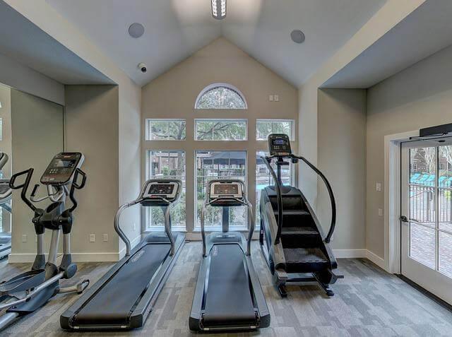 Smart Home, Fit Home: Integrating Wellness Tech Into Your Living Space 3 Home gym with treadmills and exercise equipment, integrating