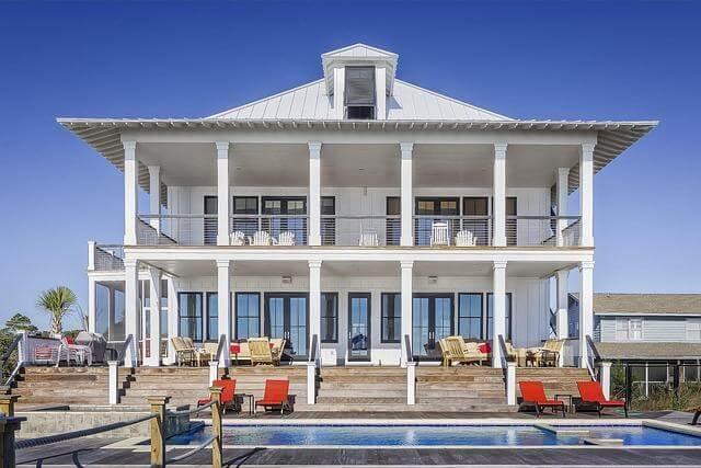 Large white house with a swimming pool