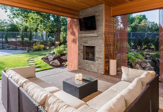 Living room with a couch and a fireplace