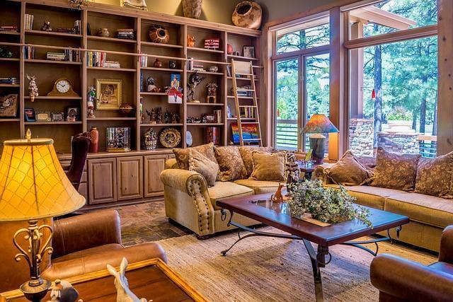 Living room with understated furniture and large window