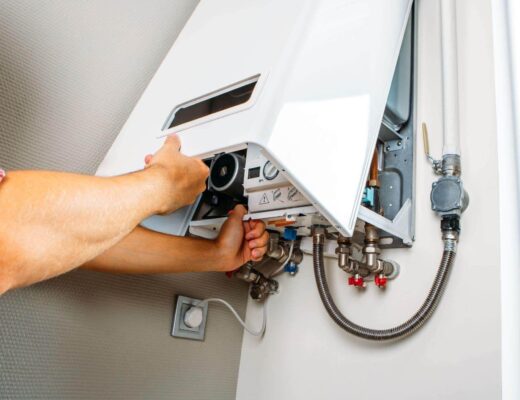 Man repairing a water heater