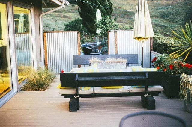 Patio with bench and umbrellas