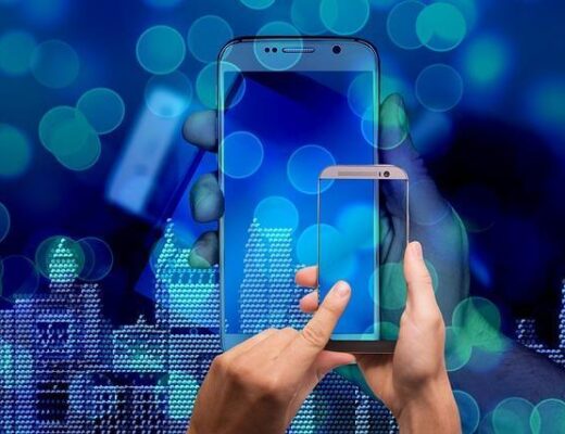 Person holding a smartphone, managing smart home wellness