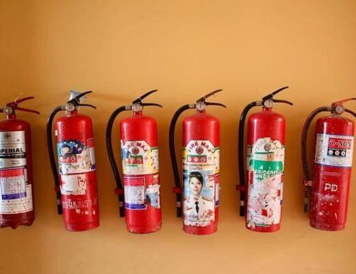 Best Orange County Fire Protection Companies Supporting Routine Inspections 7 Row of fire extinguishers for routine fire protection inspections