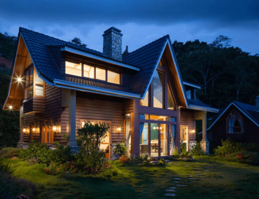 A brightly lit house with many windows