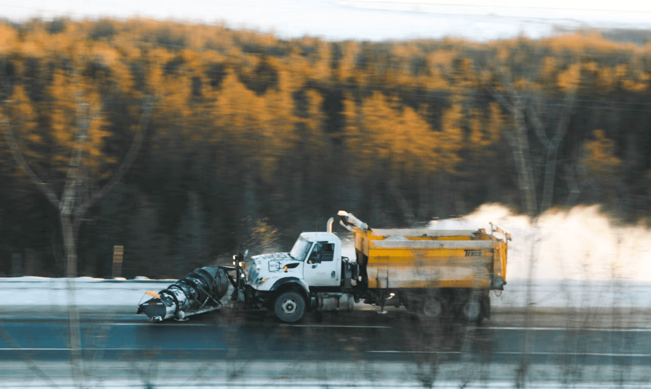 Who Is Liable in a Truck Accident? 2 Dump truck driving on a road,