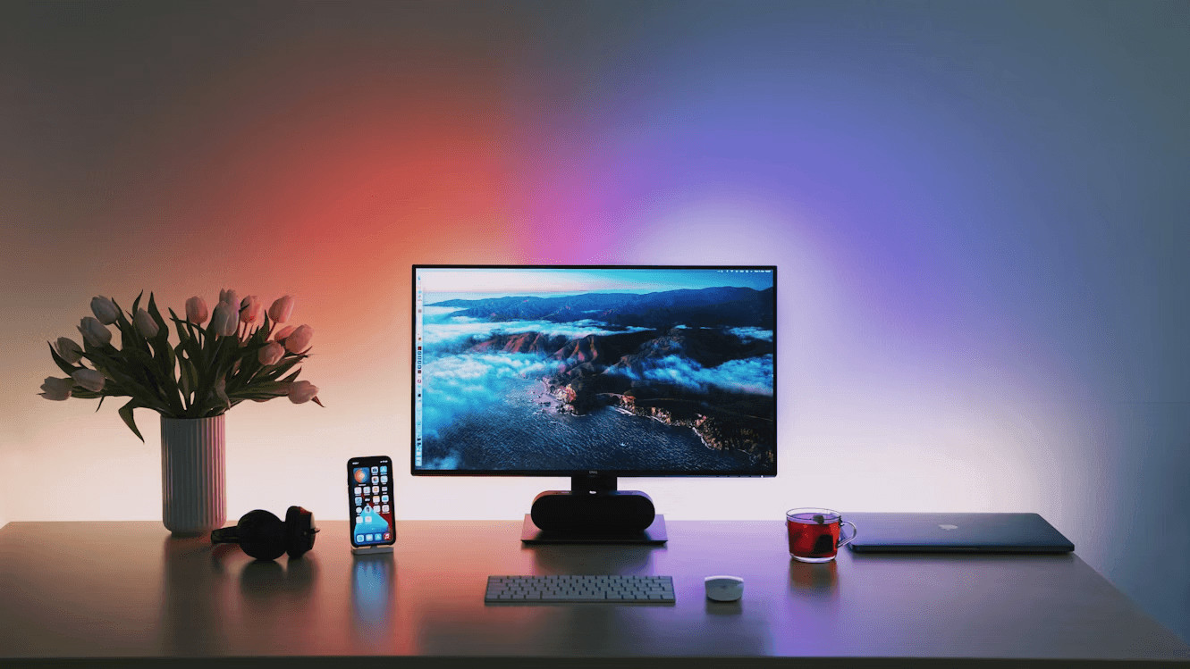 How to Create the Perfect Gaming Setup in Your Home 1 Gaming desktop computer set up on a wooden desk