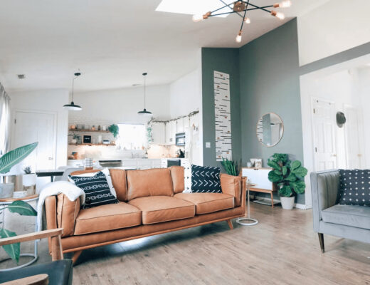 Organized living room with furniture and wooden