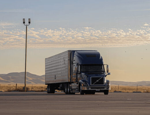 Semi-truck on a desert road related to