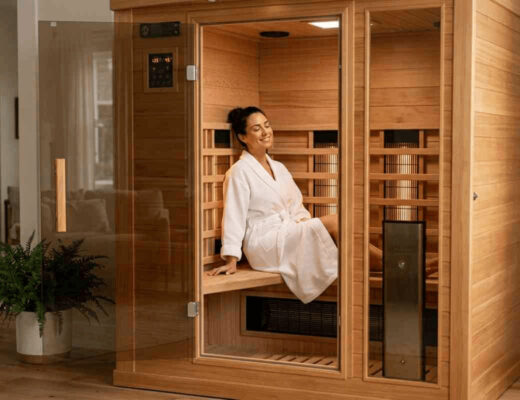 Woman sitting in an infrared sauna