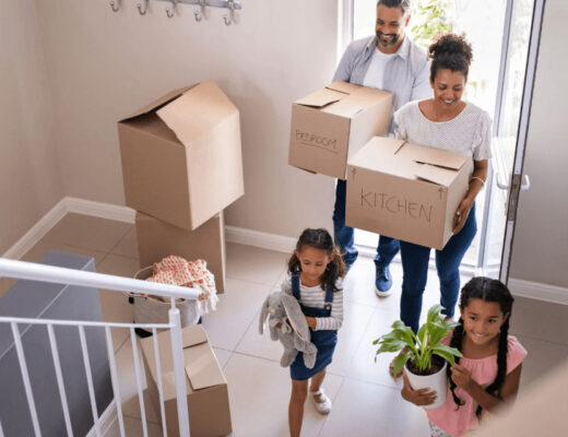 A family moving into their new home