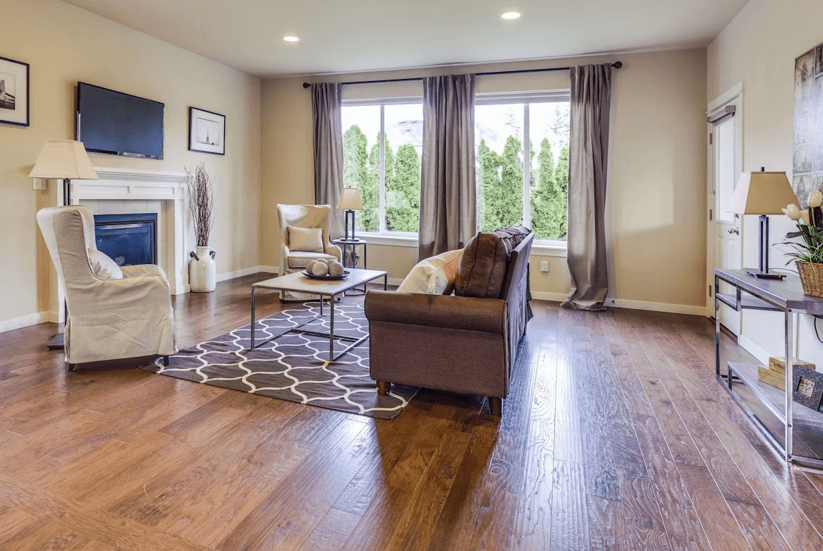 How to Replace Old Floors in Your Home 1 A living room with furniture and a