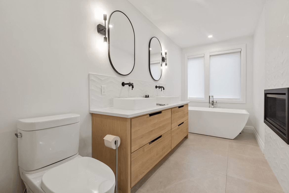 A newly redesigned bathroom featuring a toilet