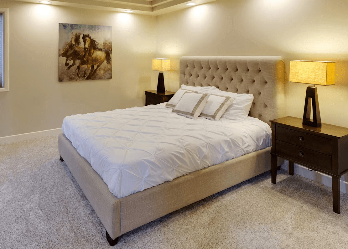 A stylish bedroom with a large bed and