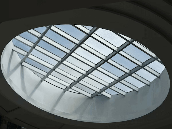 Circular skylight illuminating a modern living space