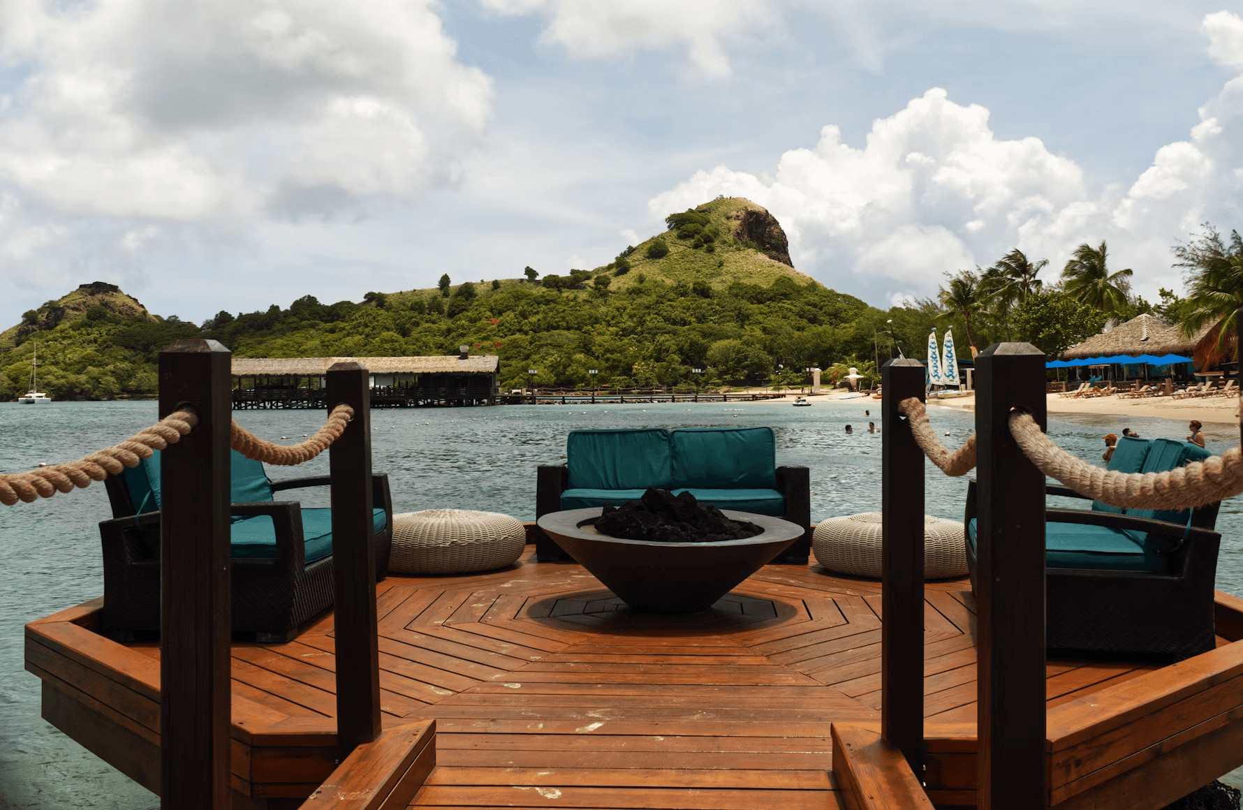 Durable wooden deck with outdoor chairs and table