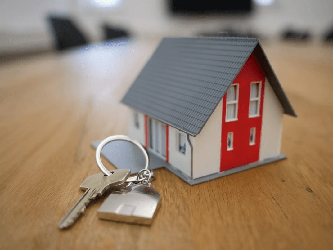 House model and keys for property owners liability