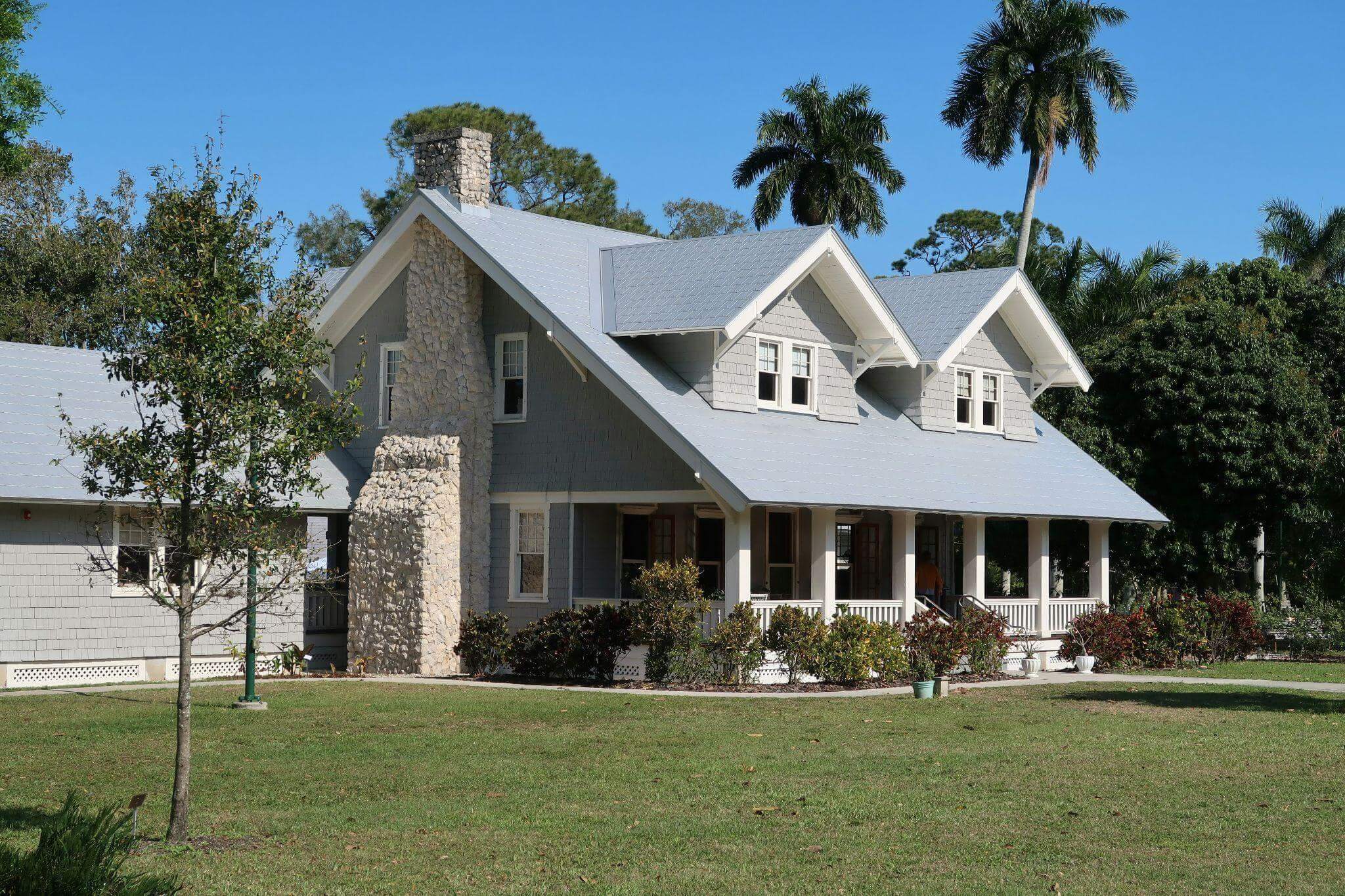 House with a gray roof and white trim