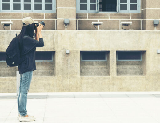 A Smart Visual Strategy For Selling Your Home: How Better Images Can Improve Your Return 4 Man using a camera to take a picture
