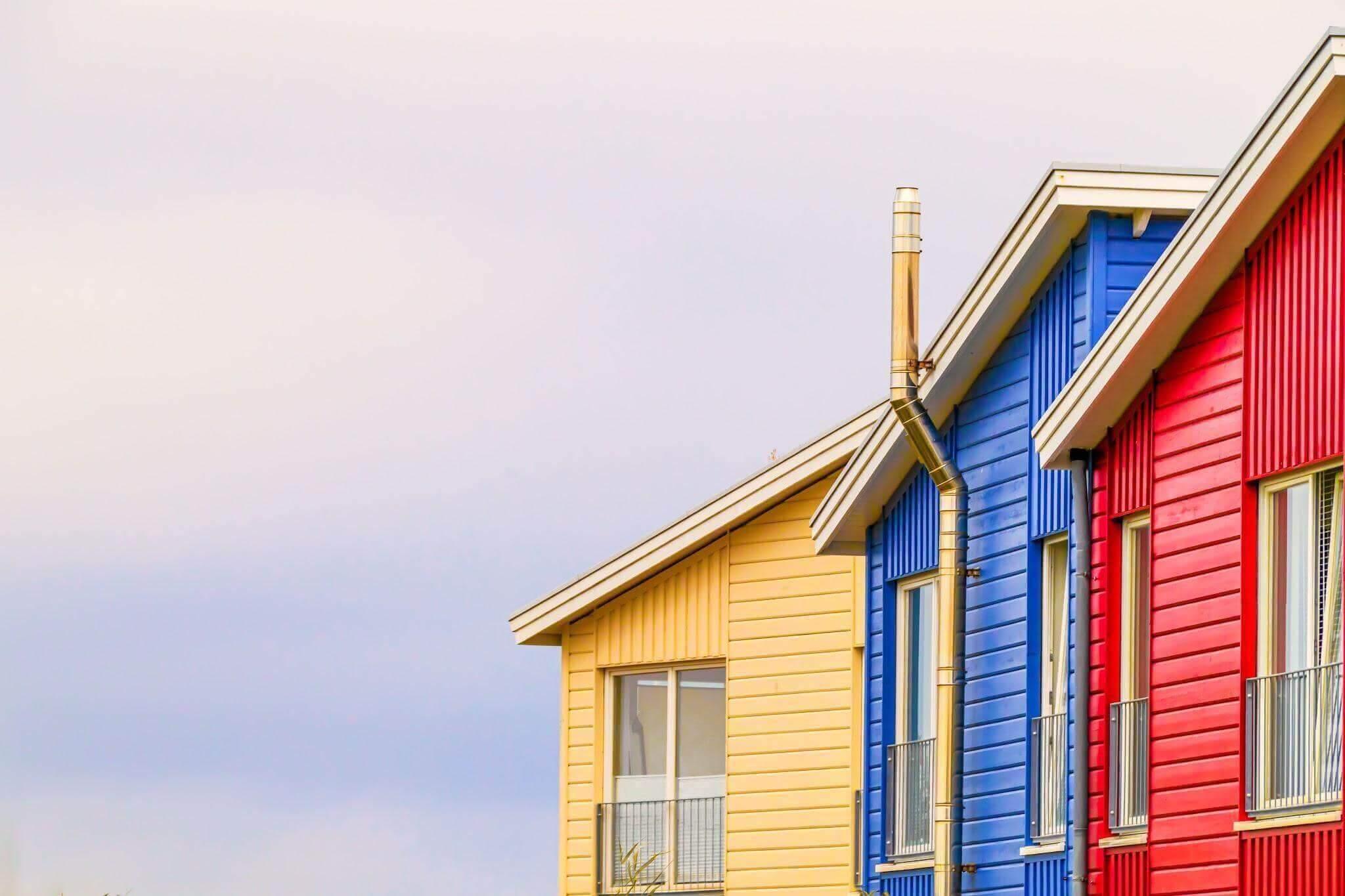 Row of colorful houses on a cloudy day