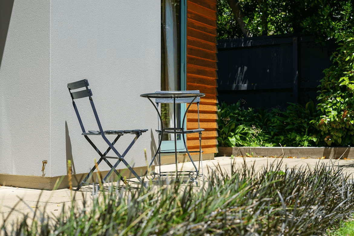 DIY Concrete Patio: How to Choose the Right Reinforcement for Your Home Project 1 Two chairs and a table on a newly built