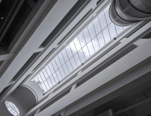 Seven Reasons Homeowners Choose Tubular Skylights for Modern Living Spaces 22 View of a tall building reaching skyward