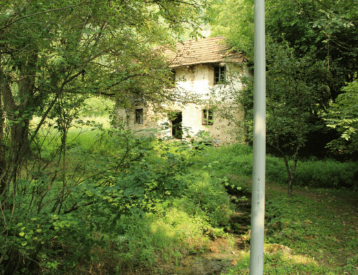 White pole in front of a house,