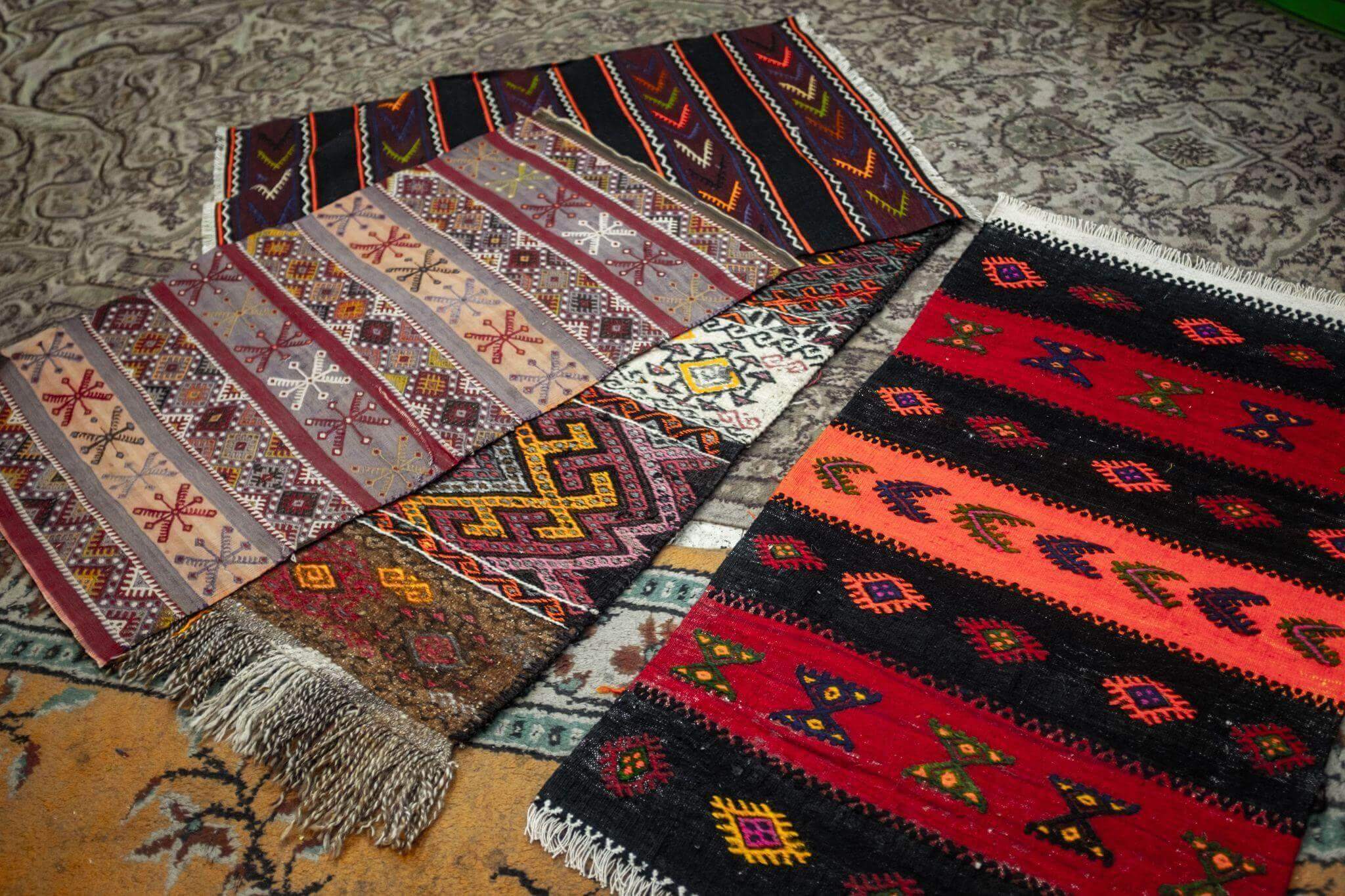 A collection of rugs in various modern styles