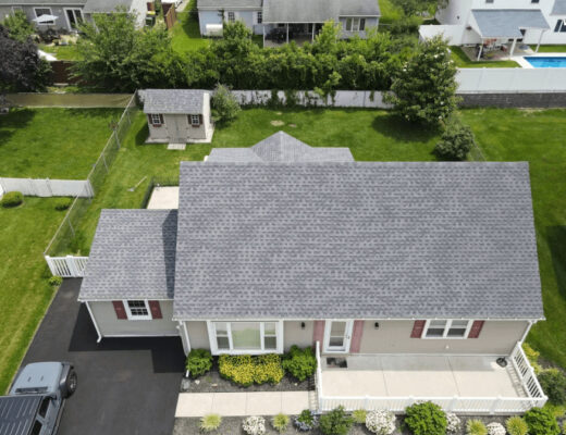 Aerial view of a house with a new roof