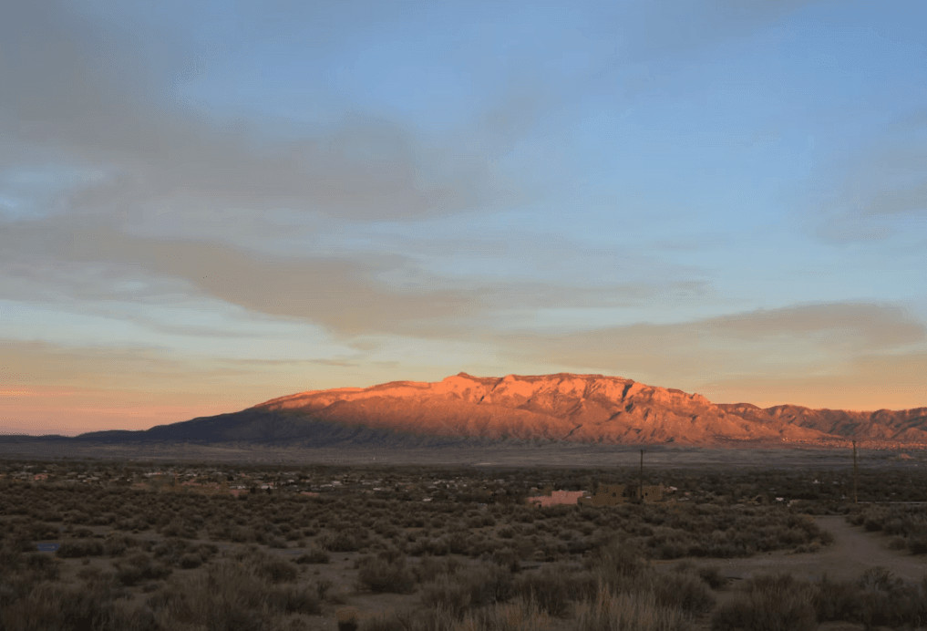 How Rio Rancho's West Mesa Wind Differs From the Rest of Albuquerque, and What That Means for Your Roof 1 Desert landscape with mountain in Rio Rancho