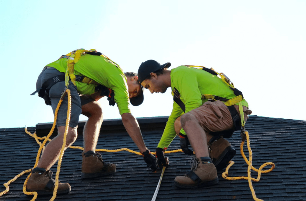 Men installing a new roof during an installation process