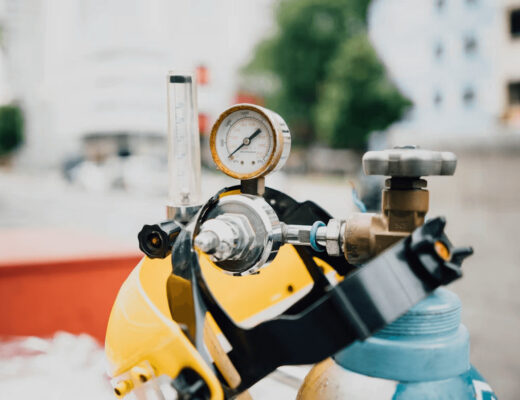 Yellow and blue fire hydrant with a pressure