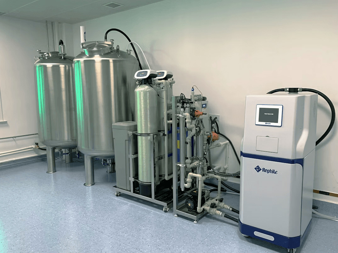 A room showing multiple hot water tanks and