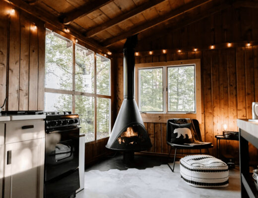 Why Your Home Isn’t Getting Warm Enough and What to Do 1 A room with a stove and chair,