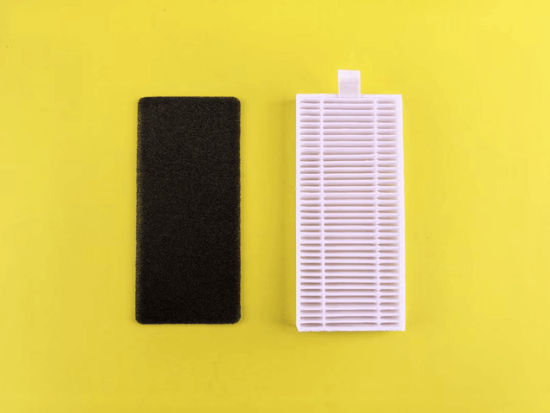 A white comb and a black comb on a yellow