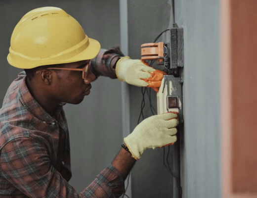 Man in hard hat and safety gloves